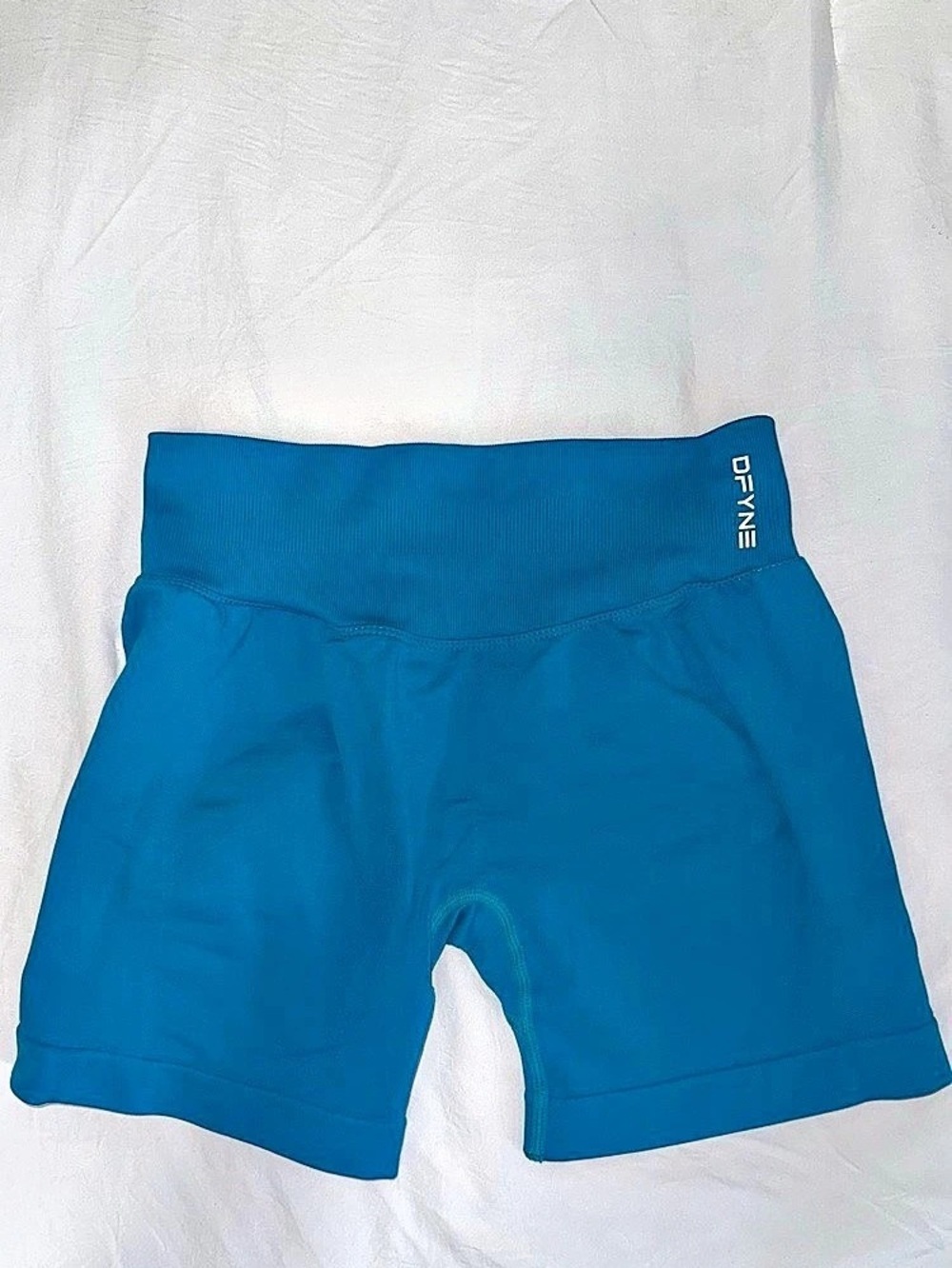 DFYNE Women’s Medium impact 4.5” shorts in Glacier Blue